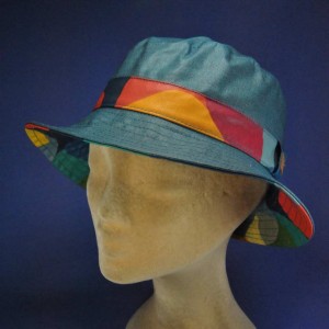 Chapeau de pluie imperméable multicolore petrole femme