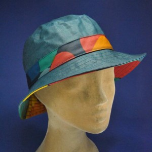 Chapeau de pluie imperméable multicolore petrole femme